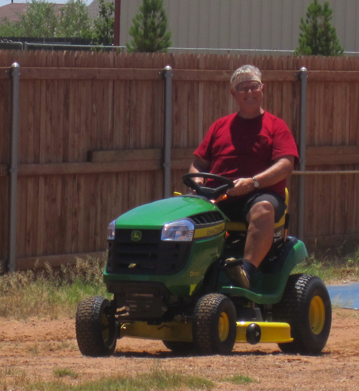 Dave, the gentlemen farmer on his John Deere.